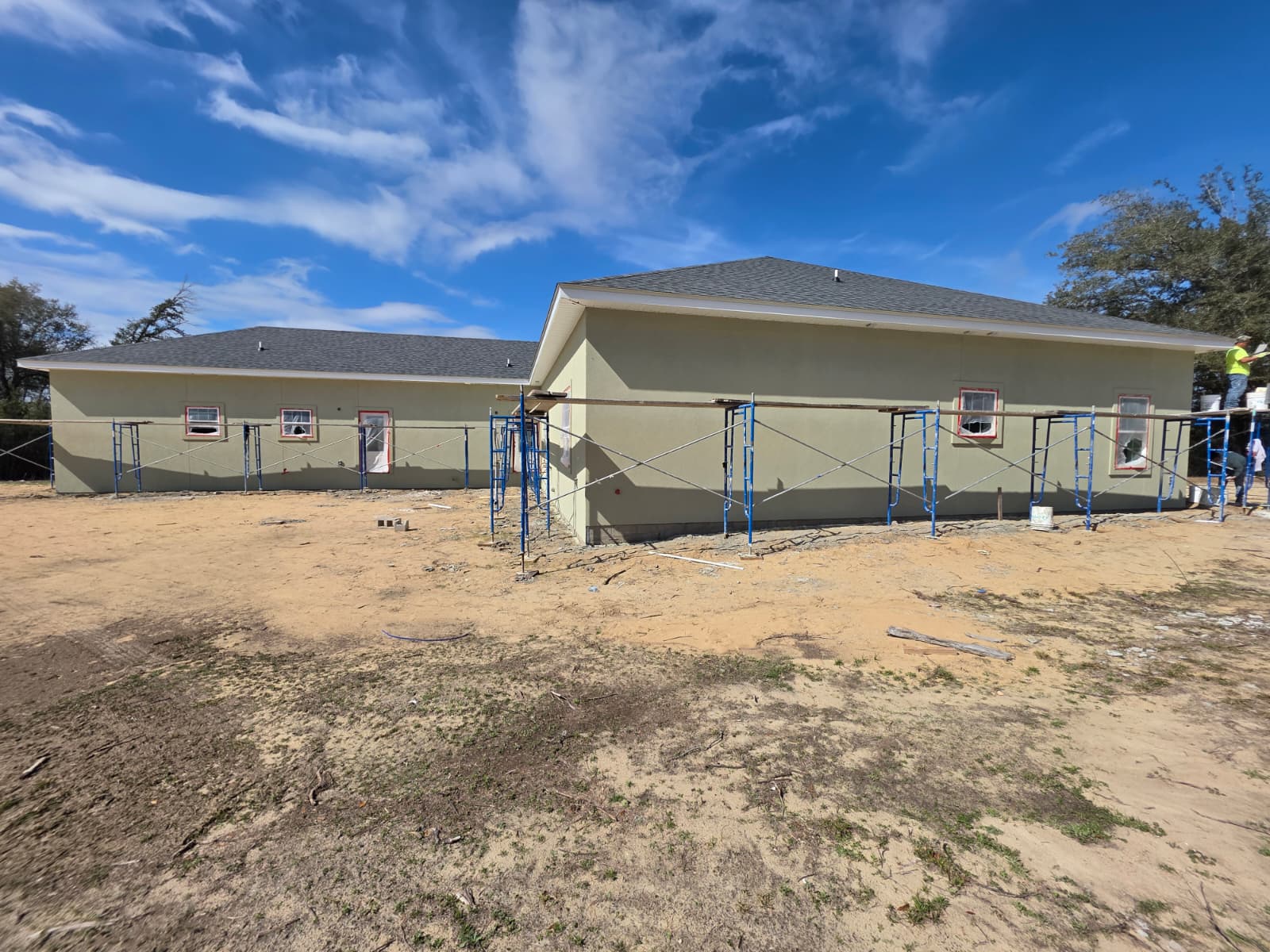 Commercial brick wall stucco repair