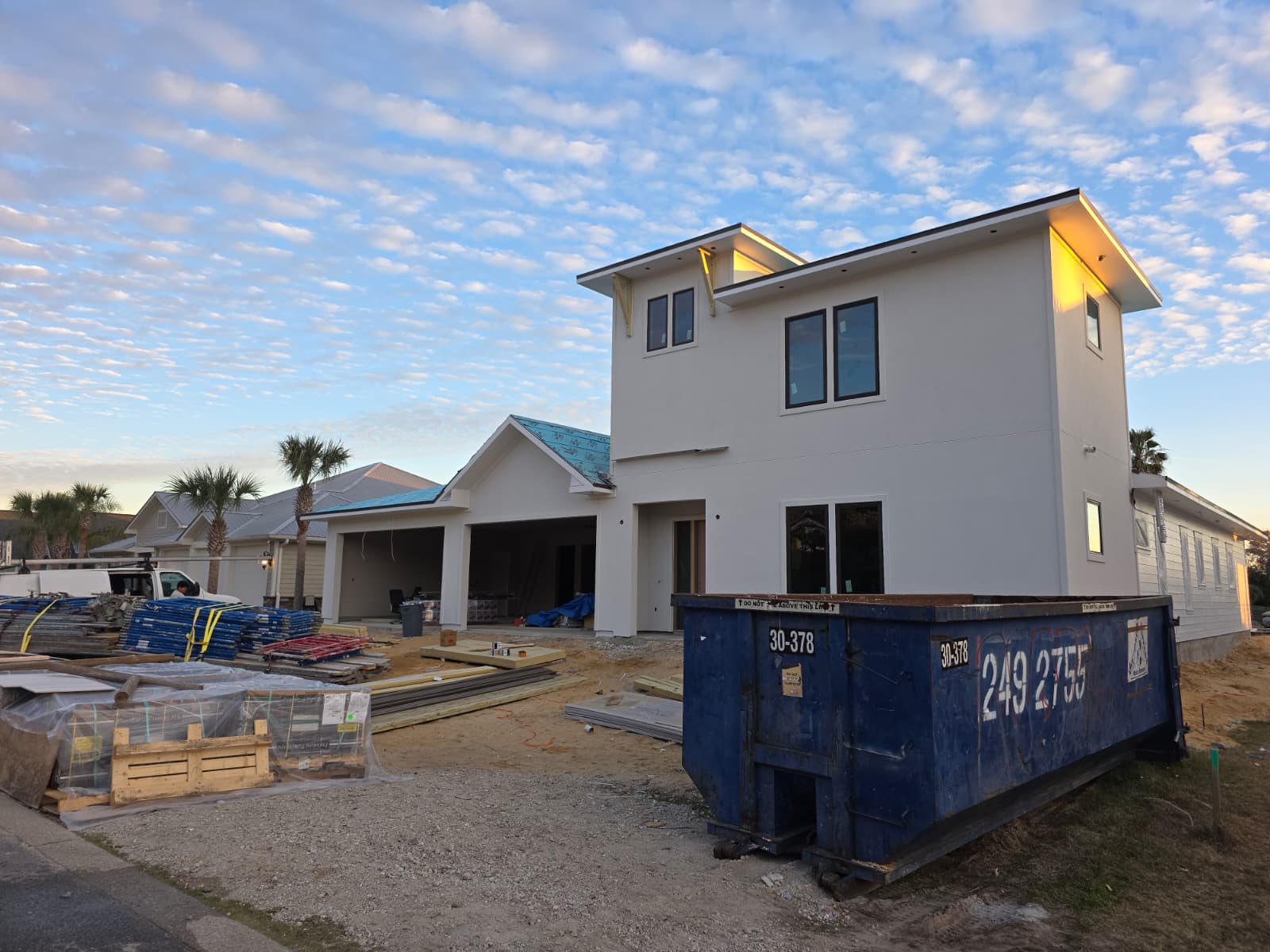 K&C truck at new construction coastal home sunset