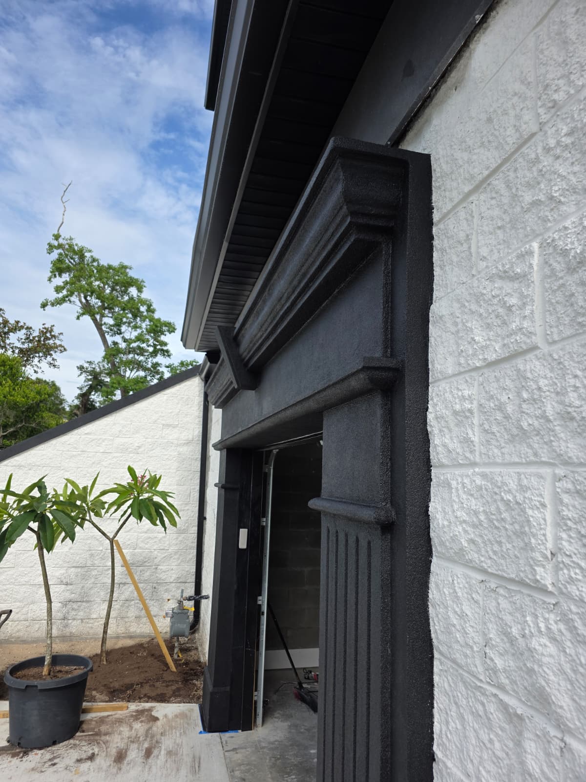 Dark stucco crown molding detail