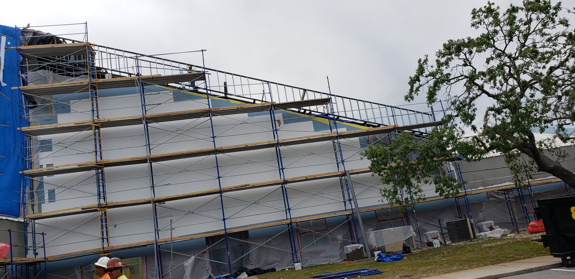 Church EIFS construction with scaffolding