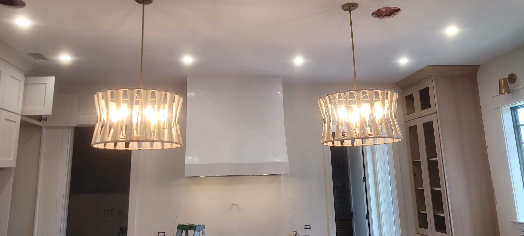 Recessed ceiling with modern pendant lighting