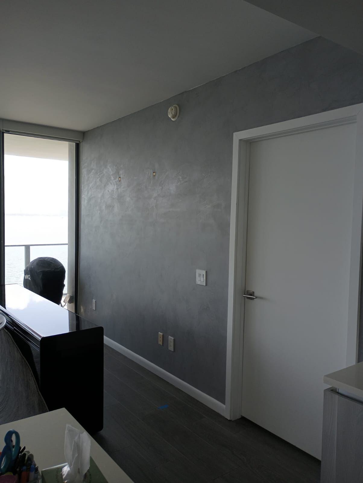 Venetian plaster gray polished wall